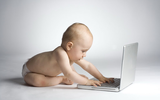 /images/baby_with_computer.jpg